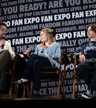 a group of people sitting in chairs