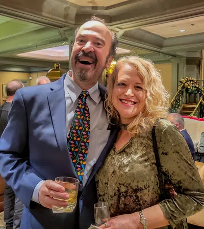 a man and woman posing for a picture