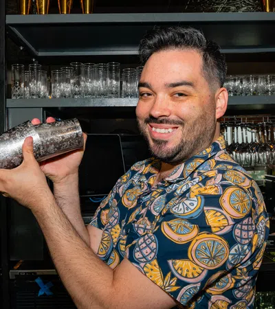 a man holding a fish