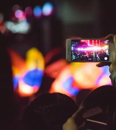a person holds a cell phone