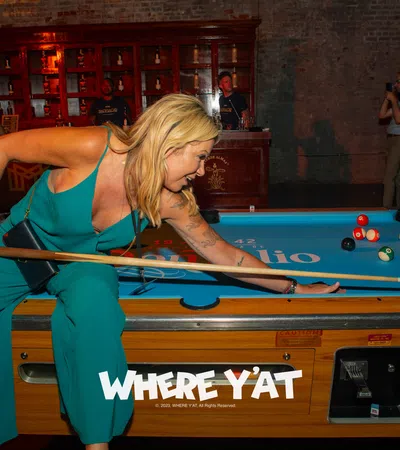 a person playing pool