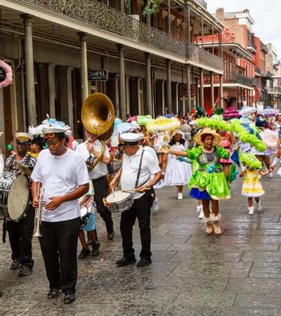 a group of people playing instruments on a street