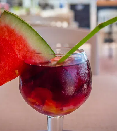 a glass with a drink in it
