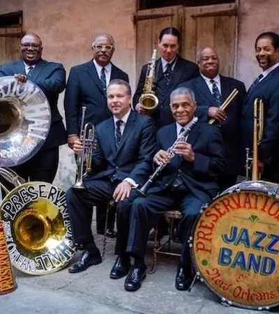 a group of men holding instruments