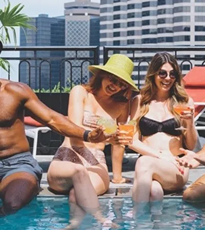 a group of people sitting in a pool