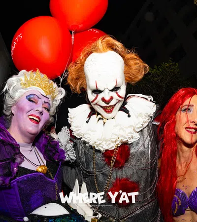 a group of people dressed as clowns