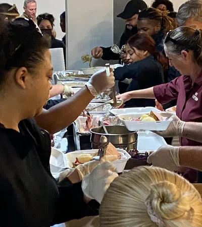 a group of people eating food