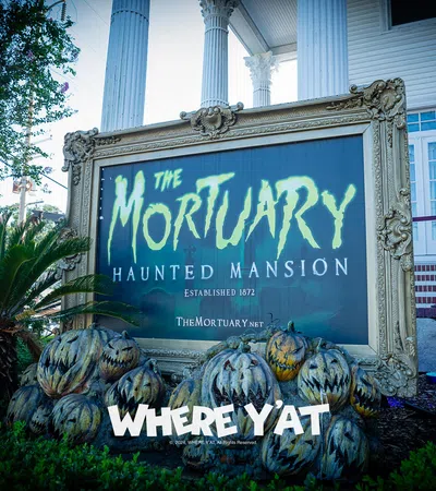 a sign in front of a building