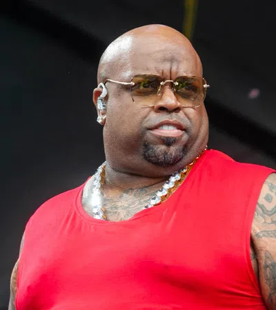 CeeLo Green with tattoos and a microphone
