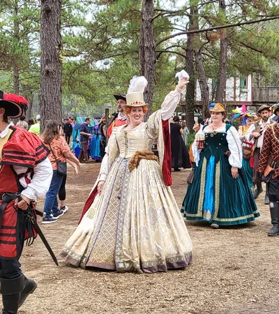 a group of people in clothing dancing