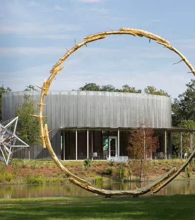 a structure outside with trees around it