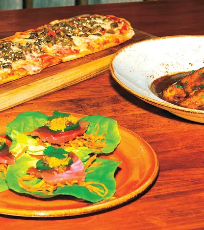 pizzas on plates on a table