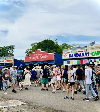 a large group of people walking on a street