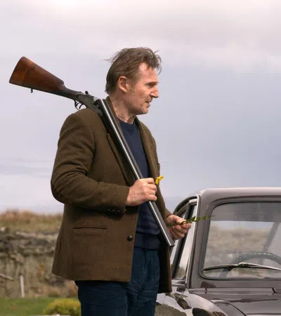a man holding a gun