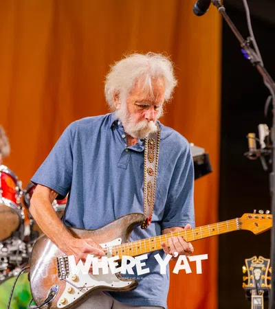 a person playing a guitar