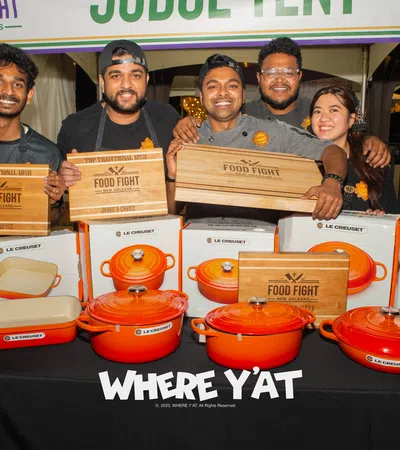 a group of people holding boxes