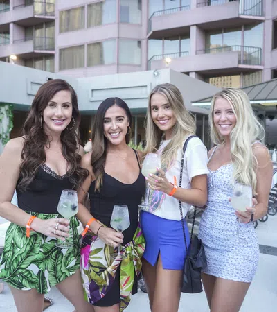 a group of women posing for a photo