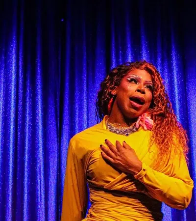 a woman in a yellow dress