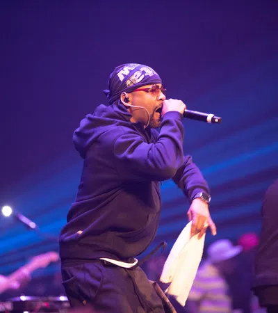 a man singing into a microphone
