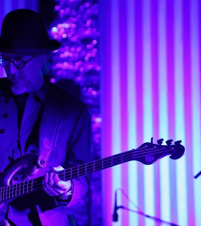 a man playing a guitar