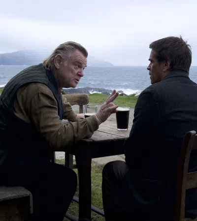 two men sitting at a table