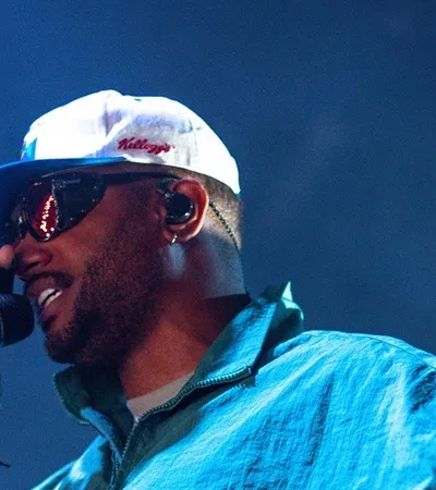 a man singing into a microphone