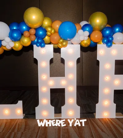 a room with balloons and a window