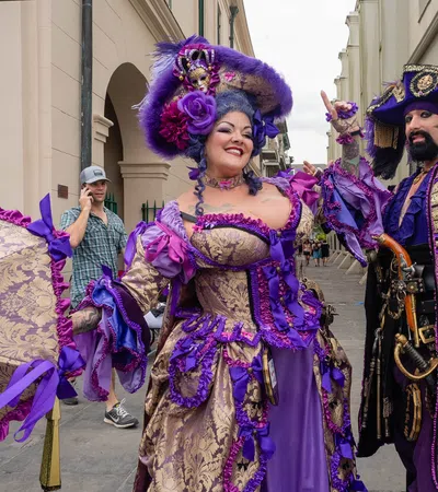 a man and woman dressed up in clothing