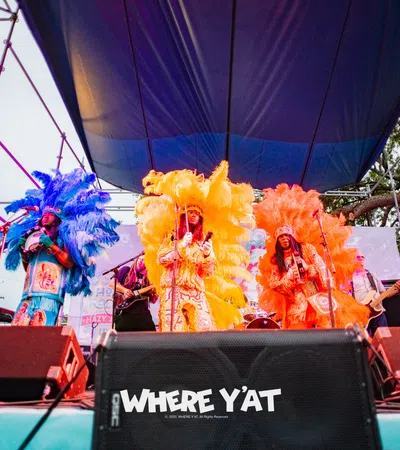a group of people performing on stage