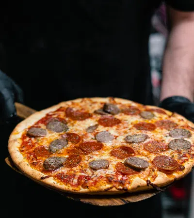 Five Places to Celebrate National Sausage Pizza Day on October 11