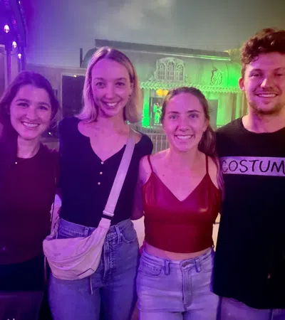 a group of people posing for a photo