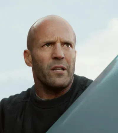 Jason Statham in a black shirt