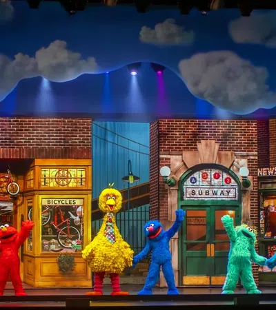 a group of people in clothing on a stage