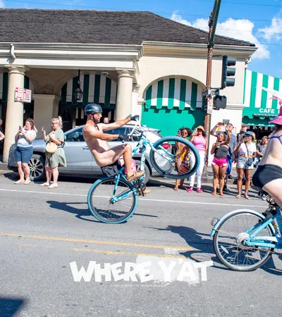 a group of people riding bikes
