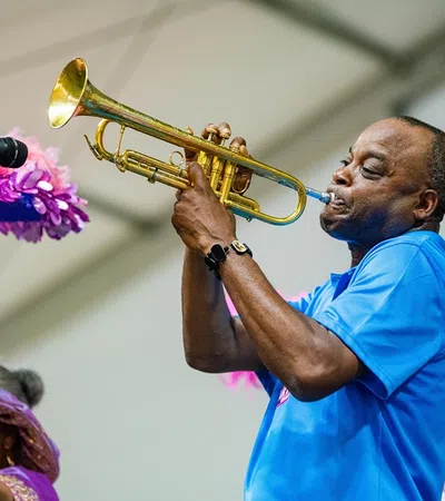 a person playing a trumpet