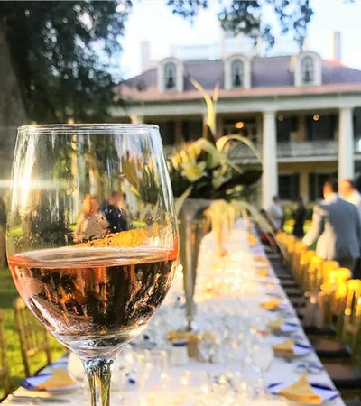 a glass of wine on a table