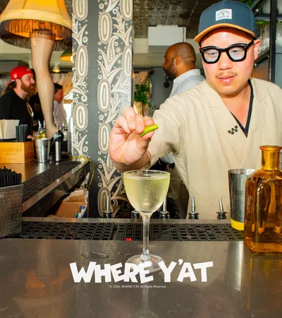 a person holding a drink