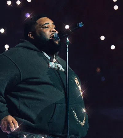 a man singing into a microphone