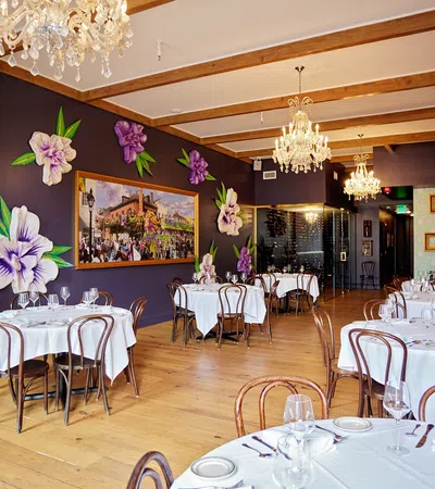 a room with tables and chairs