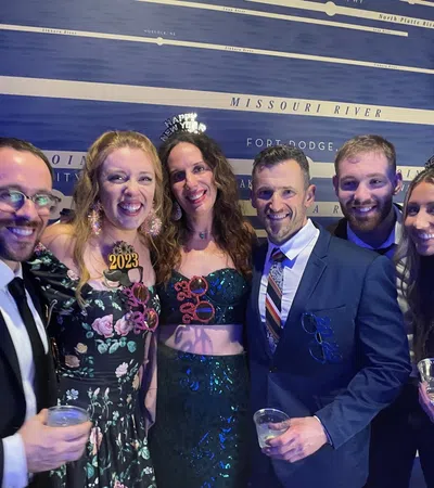 a group of people posing for a photo