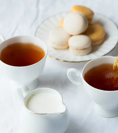 a plate of food and a cup of tea