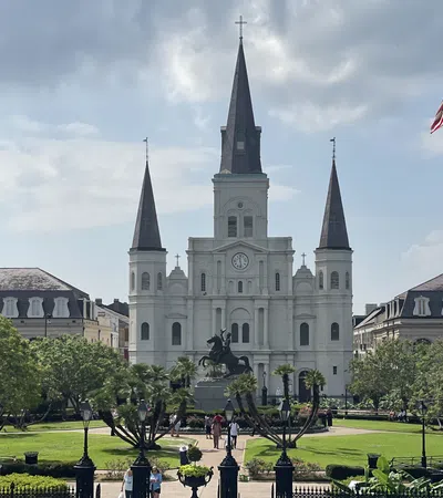a large building with a flag on top