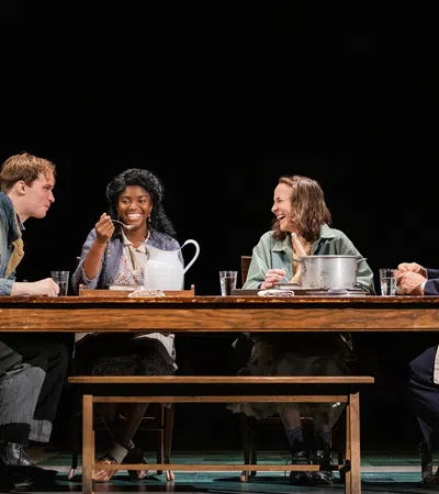 a group of people sitting at a table