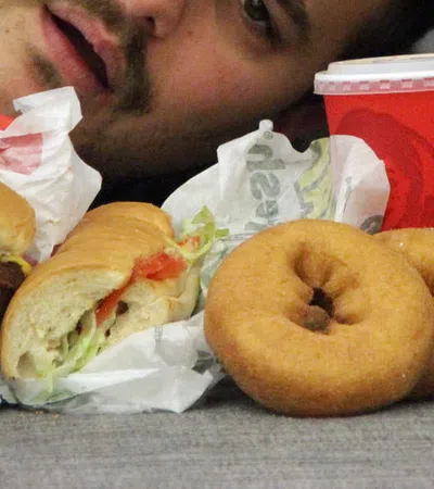 a person eating a sandwich