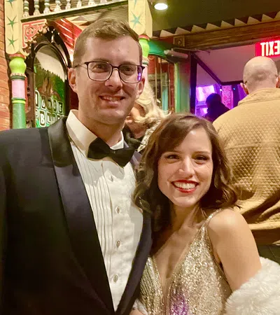 a man and woman posing for a picture
