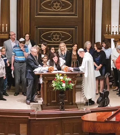 a group of people standing in a room