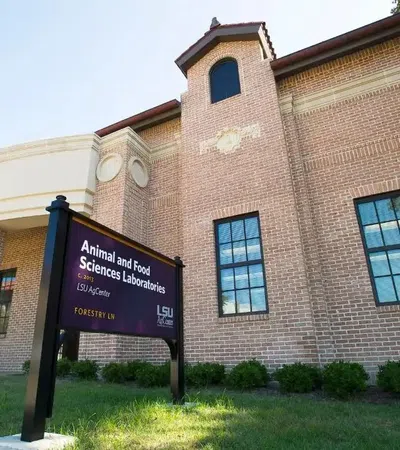 a sign in front of a building