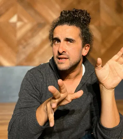 a man with his hands up