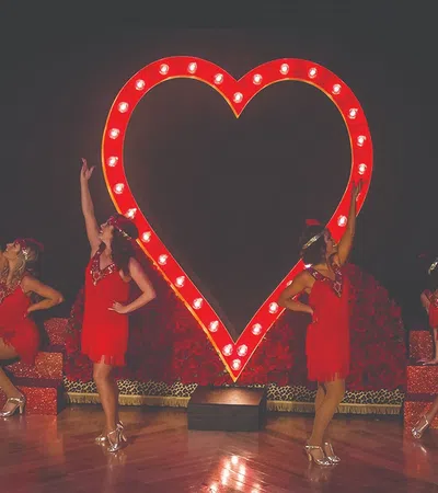 a group of women dancing on a stage