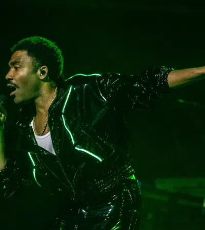 a man singing into a microphone